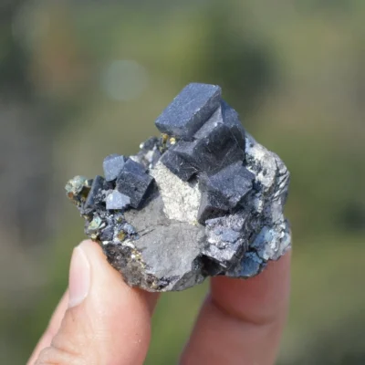 Bismuthinite Inside Fluorite With Arsenopyrite Crystals